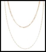 Two stamped 9ct gold necklace chains to include a figaro chain with a spring ring clasp and an