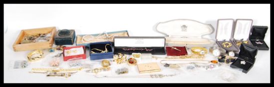 A collection of vintage costume jewellery to include a selection of ladies wrist watches to