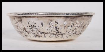 A early 20th Century silver hallmarked bonbon dish, having pierced decoration and gadrooned rim.