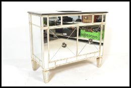 A contemporary Venetian glass mirrored free standing cabinet / sideboard vanity unit having a