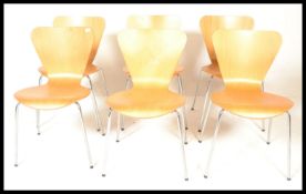 A contemporary set of 6 Arne Jacobsen (1902-1971, Denmark) style ant stacking dining chairs. Each