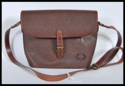 A vintage Mulberry chocolate brown scotch grain leather bag.  This handbag has front and interior