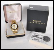 A Citizen analog quartz multi chronograph gents wrist watch, white enamel face with gilt baton