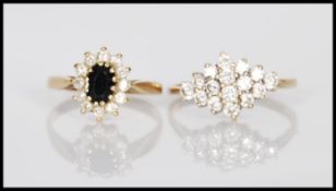 Two 9ct gold ladies dress rings to include a hallmarked ring set with an oval cut sapphire with a