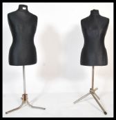 A pair of 20th Century shop display mannequins, the mannequin torsos upholstered in a black satin
