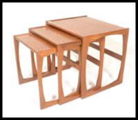 A G-Plan retro teak wood 1970's graduating nest of tables in the Quadrille pattern. The tables
