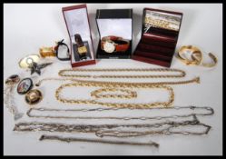 A collection of vintage costume jewellery to include a ceramic Limoges brooch, a rolled gold