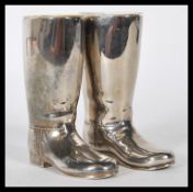 A pair of 20th Century silver plated boot drink measures for spirits by Grenadier England, having