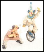 TWO LARGE JUN ASILO POLYRESIN CLOWNS