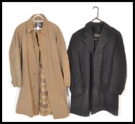 Vintage 20th Century clothing- A Burberry Mackintosh cream Trench coat having check lining, together