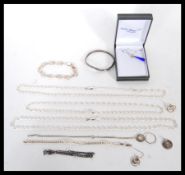 A selection of stamped 925 silver jewellery to include three rope twist necklaces, a demi parure