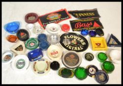 A group of 20th century advertising point of sale pub breweriana ashtrays to include John Smith's,