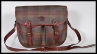 A vintage Mulberry plaid shooting style satchel / messenger bag.  This tartan check leather unisex