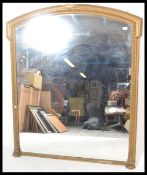A good early 19th century very large gilt wood overmantel mirror. The large frame with gilded finish