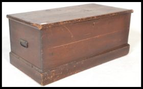 A 19th Century Victorian pine blanket box chest, hinged top with open storage, carry handles to