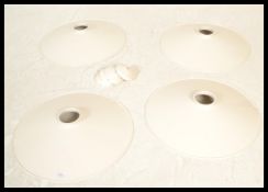 Light Shades - A group of four retro industrial factory style UFO form lampshades having white