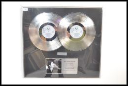 A limited edition collectors series 2x platinum sales award for John Lennon and Yoko Ono's  Double