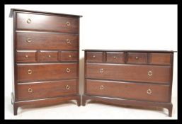 A Stag Minstrel mahogany tallboy chest of four long and three short drawers together with a matching