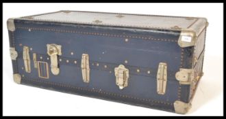 An early 20th century travelling compactum trunk by Ermette, carry handles to sides with clasps