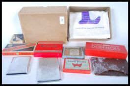 A collection of vintage miscellaneous items to include a white silk scarf,cigarette cases, playing