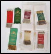 A selection of early 20th Century Four Nations Rugby committee ribbons, starting with a Wales v