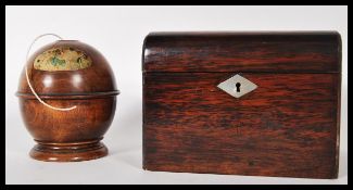 A Victorian treen worked ' Keepsake ' treen worked string spool of globular form having string inset