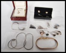 A collection of silver hallmarked and 925 stamped jewellery items to include four dress rings, six
