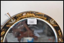 A early 20th Century 1920's Japanese chinoiserie lacquered circular bevelled edge wall mirror,