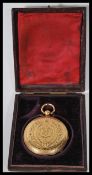 An early 20th Century stamped 18ct gold cased hunter pocket fob watch having a floral engraved