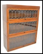 An early first half of the 20th Century mahogany Globe Wernick three section lawyers bookcase,