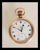 A gold plated early 20th century open faced crown winding pocket watch marked for Thomas Russell