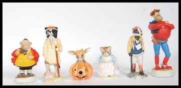 A collection pf ceramic and composite collectable figurines to include a Robert Harrop Desperate Dan