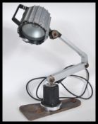 A 20th Century Retro Industrial anglepoise machine desk table lamp, having carrying handle atop