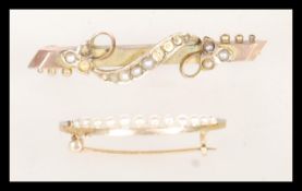 Two early 20th Century Edwardian brooches to include a hallmarked 9ct gold bar brooch having