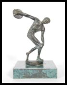 A 20th century patinated bronze cast figure of a classical discus thrower, raised  on a marble
