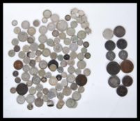 A collection of silver and copper coins dating from the 18th Century to include two 1787 George