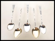 A set of five silver hallmarked Chinese silver teaspoons, each having Chinese characters