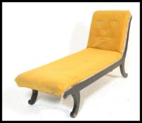 A 20th Century contemporary single scroll end chaise lounge in the Regency style being upholstered