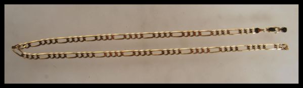 A 9ct gold triple link necklace chain set with lobster clasp being stamped 375. Length 17.5