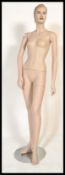 A retro 20th Century circa 1980's point of sale shop advertising display mannequin of female form