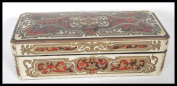 A 19th Century French boulle work glove box, the lid with a central engraved brass cartouche and