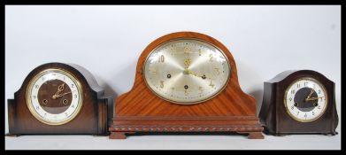 A group of three vintage 20th Century mantel clocks to include a Smiths bakelite cased clock