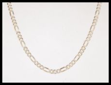 A 9ct gold stamped marcasite effect figaro link necklace, measuring 20