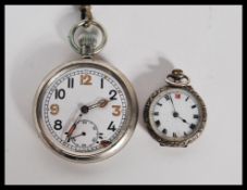 A vintage GSTP military pocket watch having a crows foot and M 83071 to the back having a white