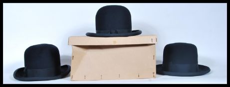 A group of three vintage 20th Century black moleskin bowler hats made by Griffson, Borsalino and