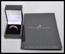 A 14ct / 585 marked gold band ring. Marked to inside shank. Weight 5.92g / Size X. Complete in