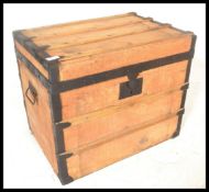 An early 20th Century pine iron bound trunk coffer chest box of square form having wrought iron drop