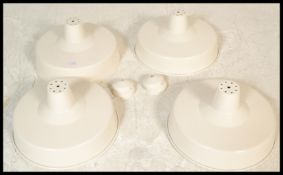 Light Shades - A group of four retro industrial factory style UFO form lampshades having white