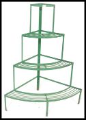 A mid 20th Century 1950's weathered green painted light steel quarter size florist plant stand