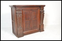 A 19th Century continental sideboard credenza buffet made of fruitwood, elm and oak. The fruitwood